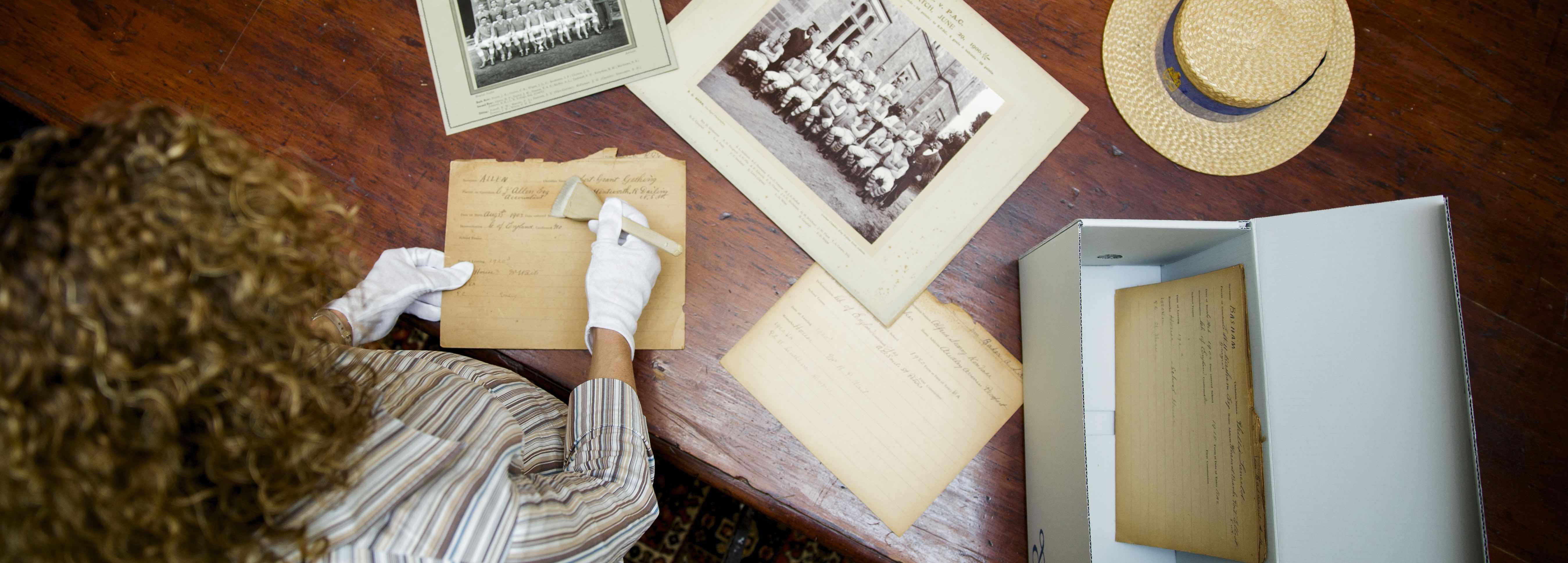 Archivist managing artefacts