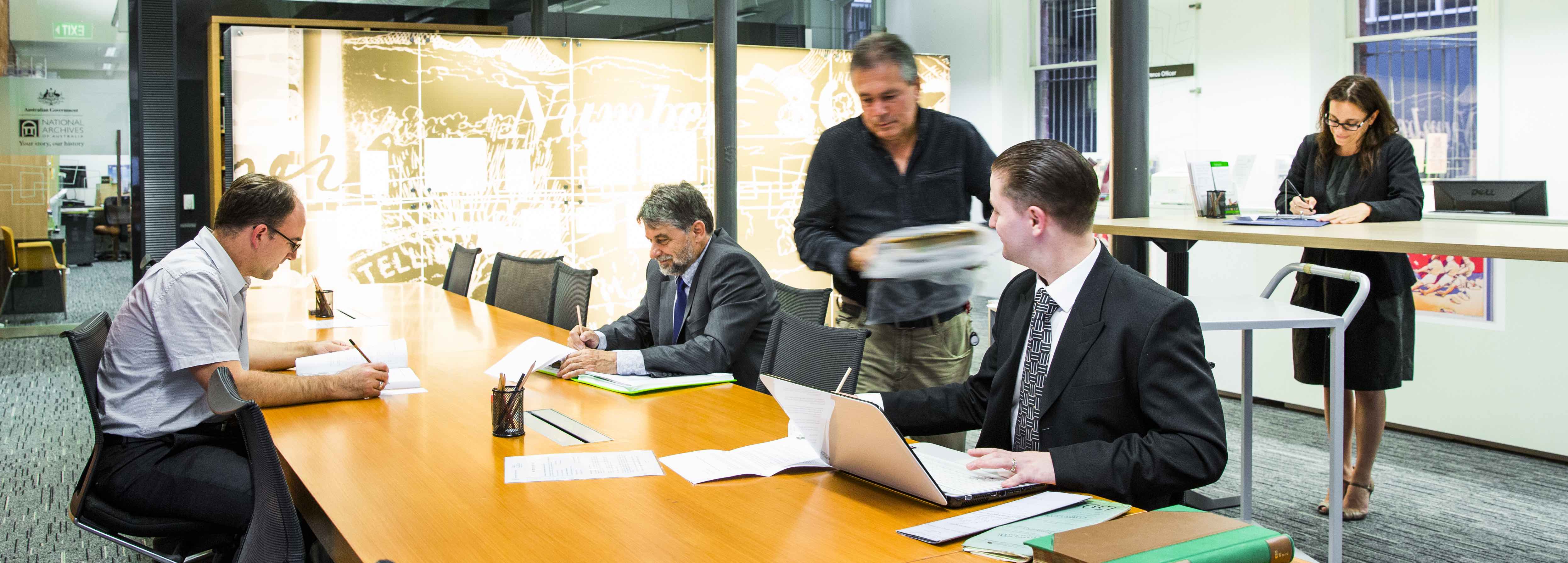 People accessing archival materials